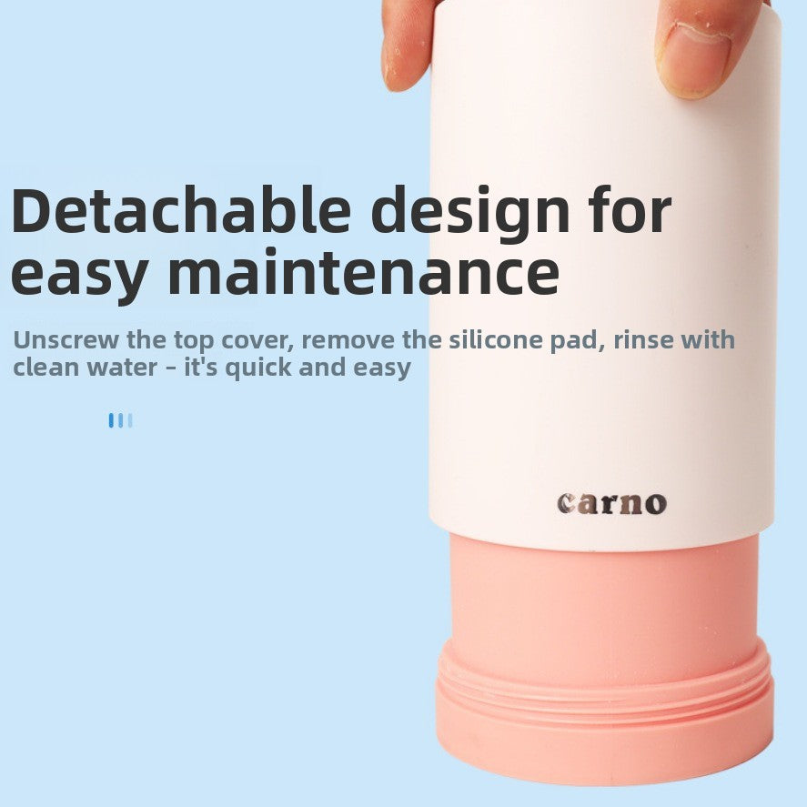 Detachable paw cleaner with the base unscrewed for easy rinsing