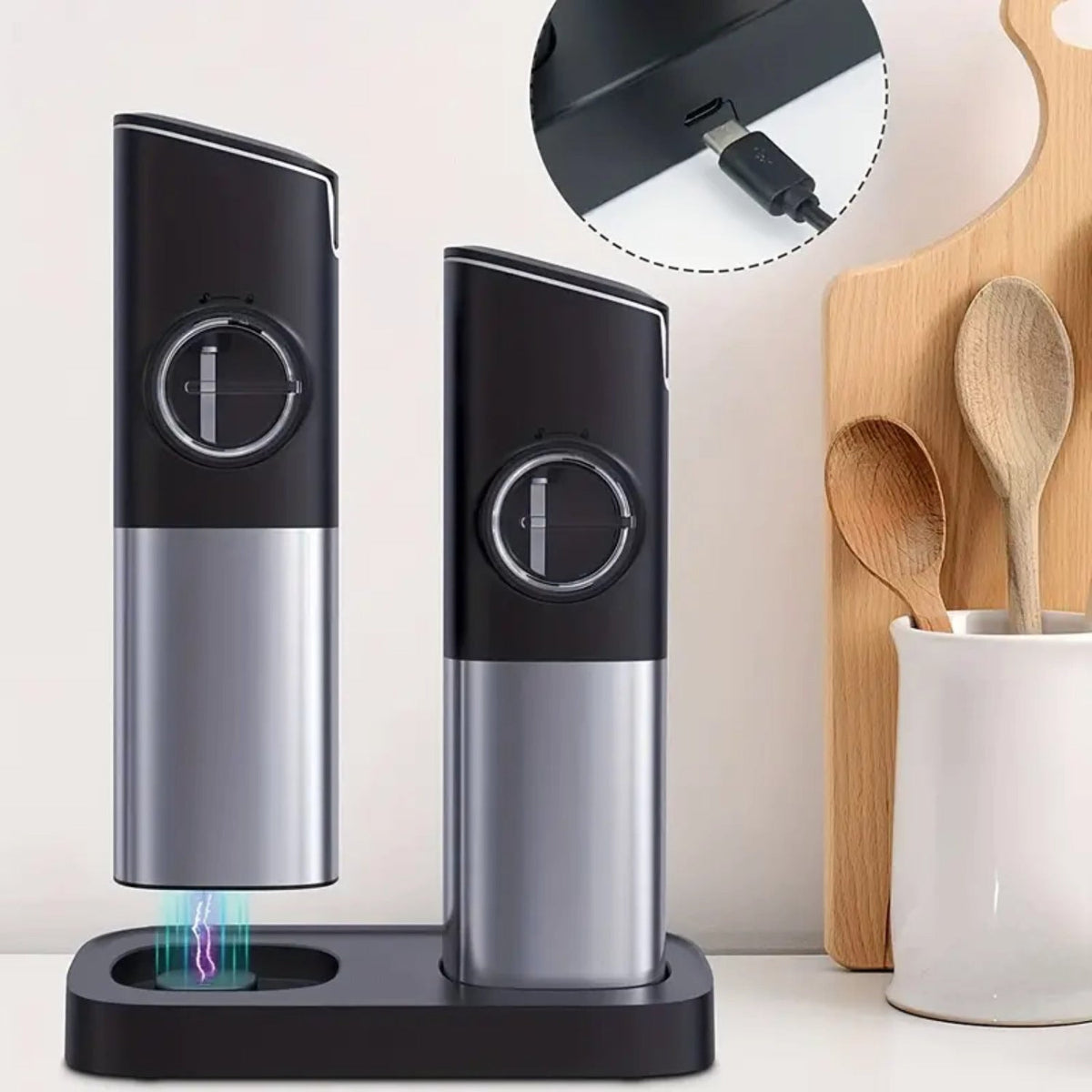 Two electric spice grinders on their charging base on a kitchen counter Main image